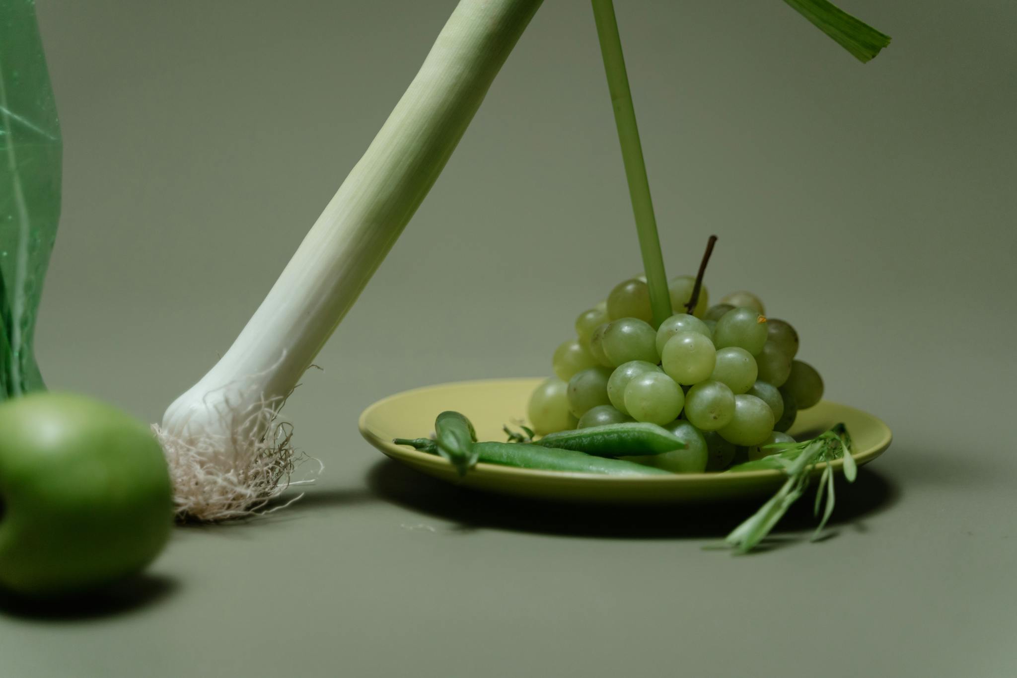 Green Grapes on Green Ceramic Plate